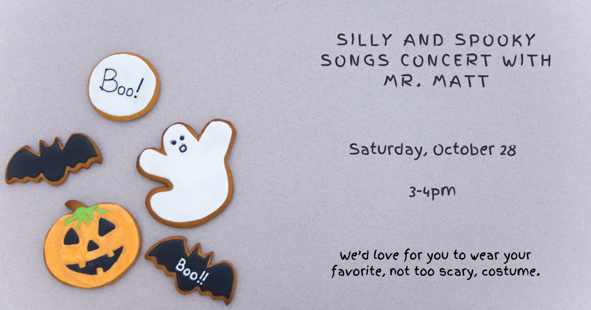 Halloween themed cookies on a sign for Silly and Spooky Songs Concert With Mr. Matt