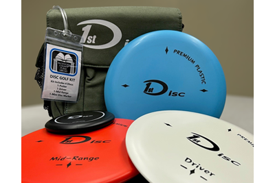 Image of Disc Golf kit. Includes carrying case and 4 discs.