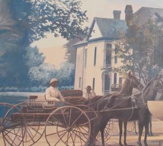 Horses drinking from water fountain in town