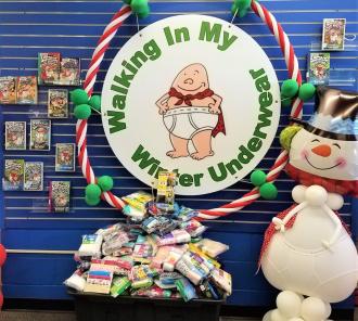 Captain Underpants with snowman and donations