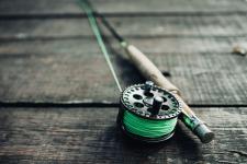 Fly fishing rod with green string