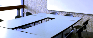 image of tables in conference room.