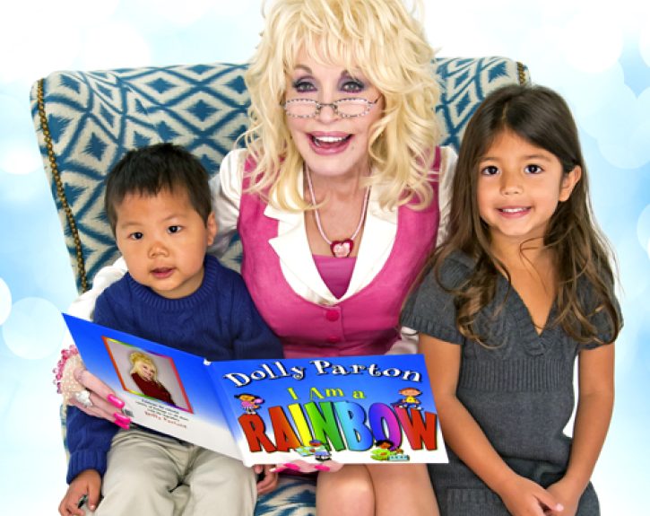 Dolly reading to children on chair