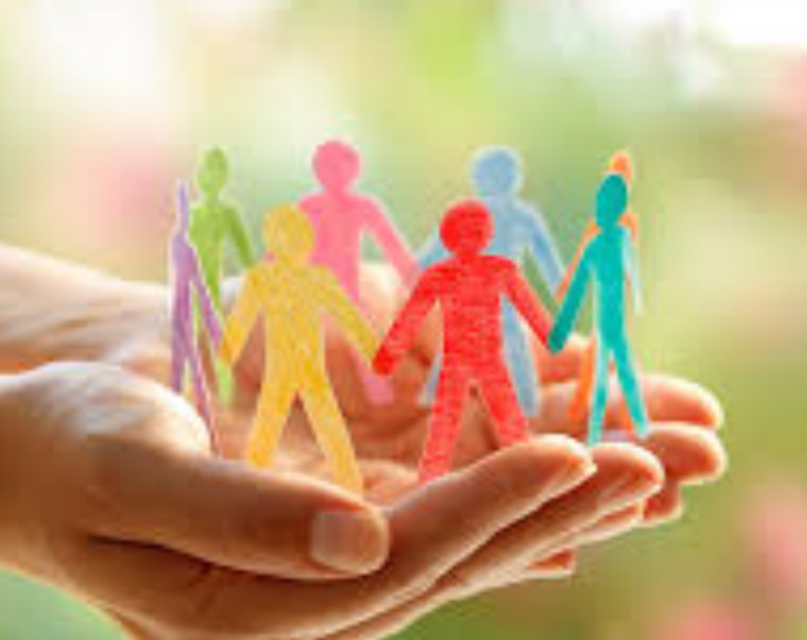 hand holding paper cut-outs